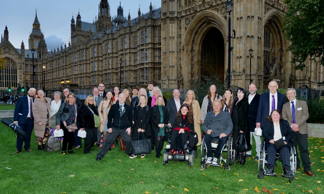 Phab attendees, supporters and staff posing together outside of the House of Lords.